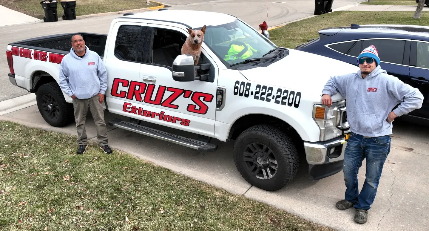 Cruz's Exteriors team with happy clients